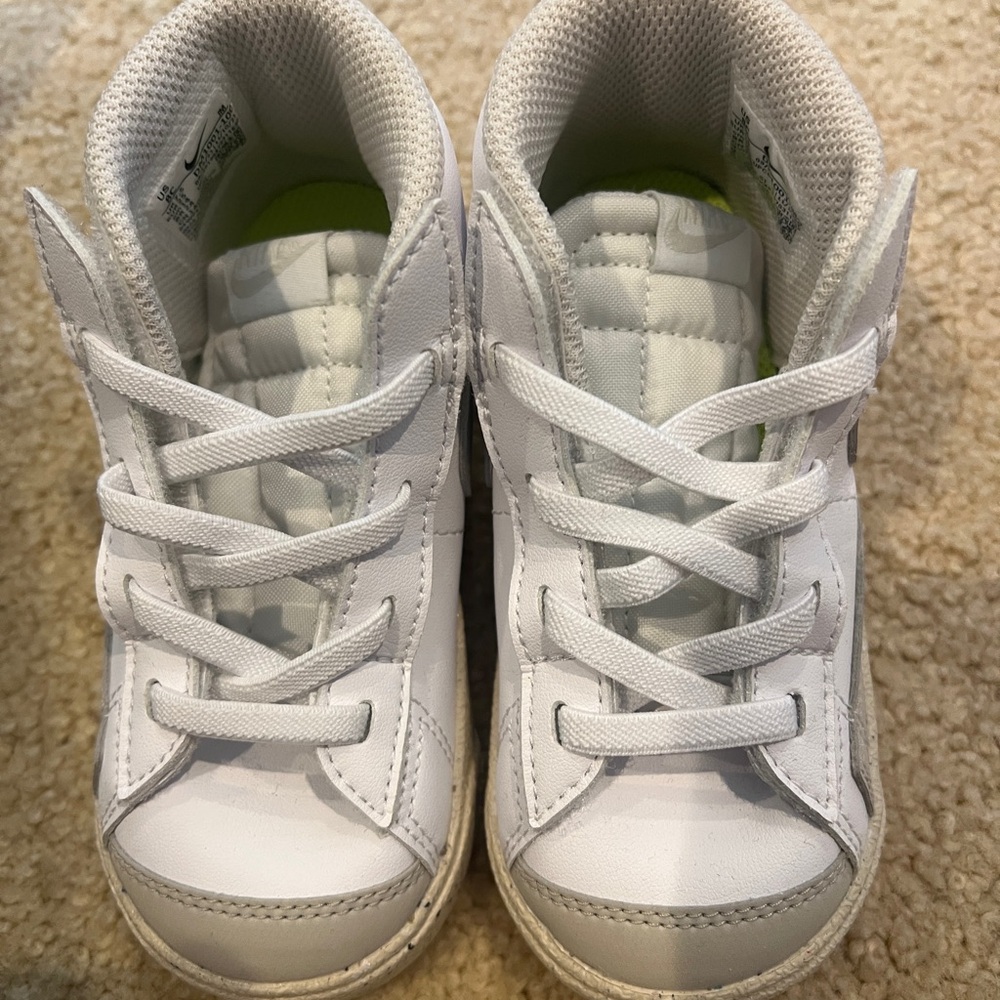 White and beige toddler Nikes. Size 8c